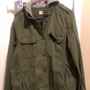 Woman’s green hoodie jacket with pockets